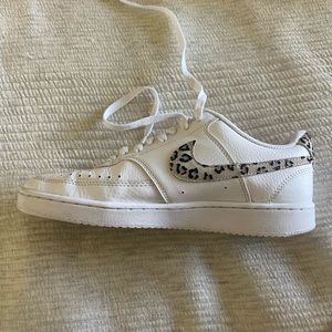 White Nike with cheetah shoes